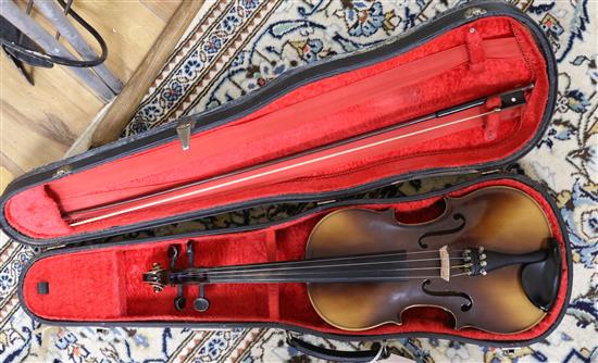 A Rosetti violin bearing faux Stradivarius label, cased with bow